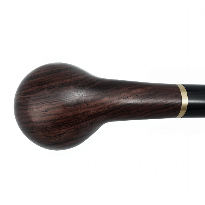 Bottom view of the rounded ebony wood bowl highlighting the natural grain pattern.