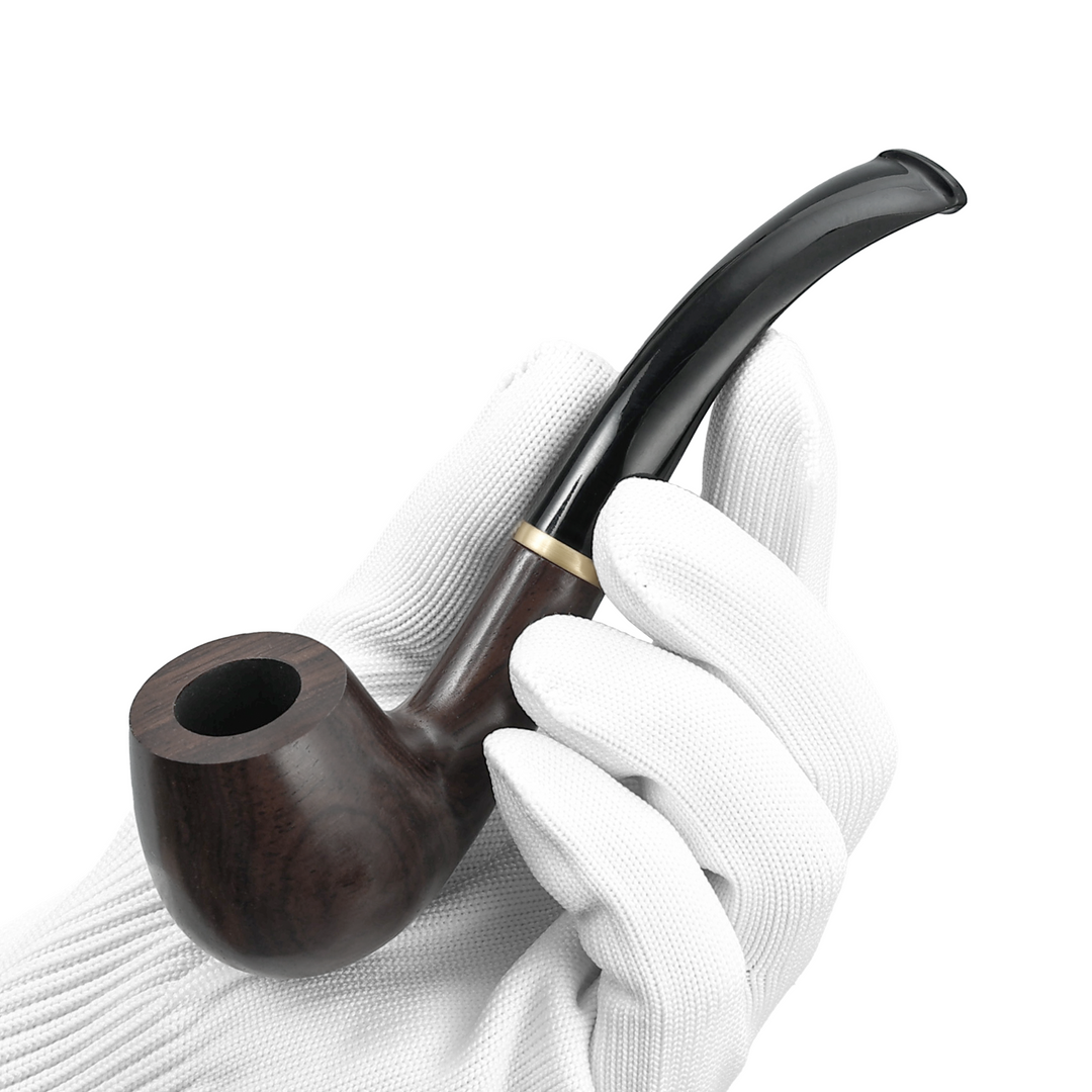 Joyoldelf ebony wood pipe with curved black stem held in a gloved hand.