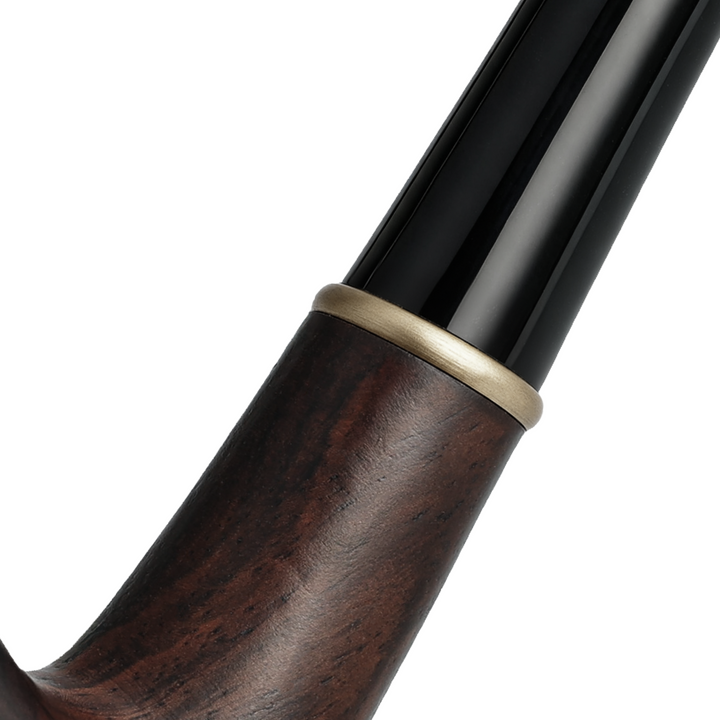 Detailed close-up of the Joyoldelf pipe’s ebony wood shank and matte brass ring connecting to the glossy black stem.