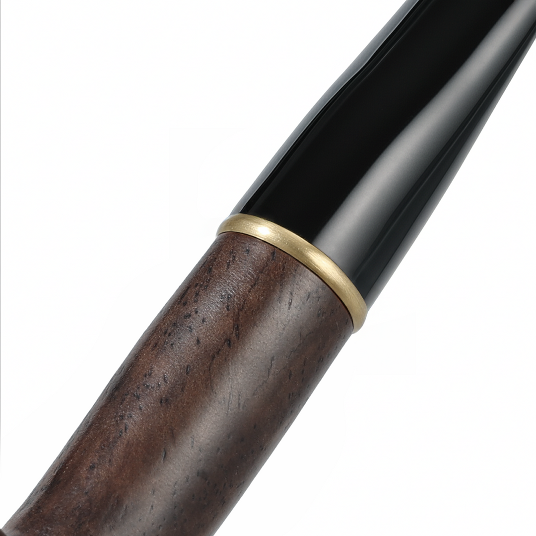 Obetis ebony wood pipe — brass ring and tapered black stem detail shot