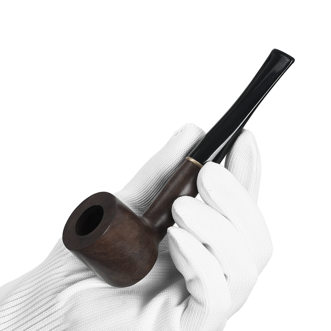 Obetis ebony wood pipe — scale view held in gloved hand, showcasing size and craftsmanship